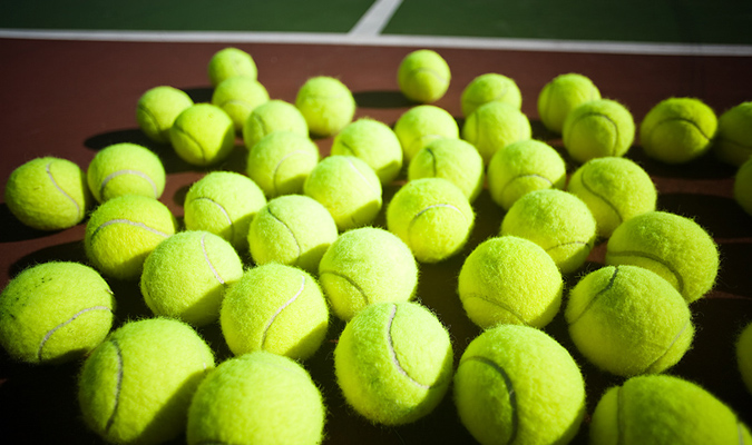 Le palline da tennis sono gialle o verdi?