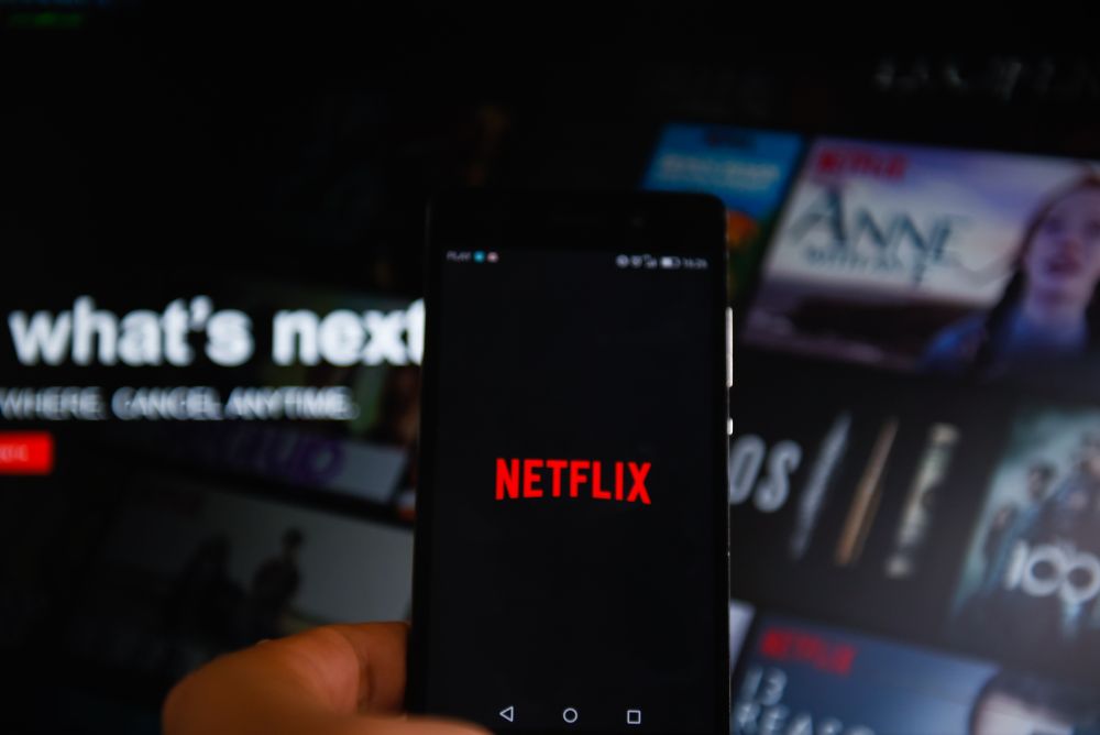 Netflix, vietato condividere la password: ecco cosa si rischia